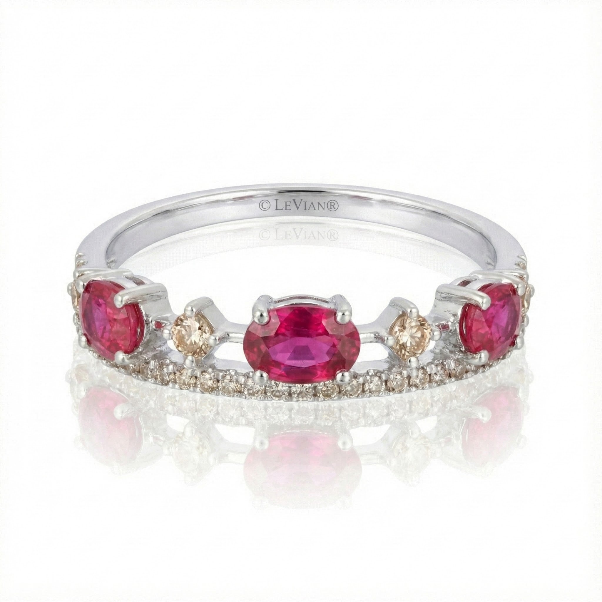 Le Vian® 14K Vanilla Gold® Passion Ruby® & Vanilla Diamond® Ring (7/8ctw) This romantic Le Vian® band showcases 5/8 cts. of vivid Passion Ruby® gemstones accented by 1/4 cts