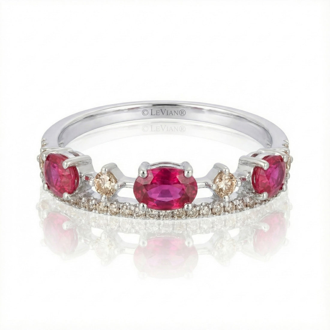 Le Vian® 14K Vanilla Gold® Passion Ruby® & Vanilla Diamond® Ring (7/8ctw) This romantic Le Vian® band showcases 5/8 cts. of vivid Passion Ruby® gemstones accented by 1/4 cts