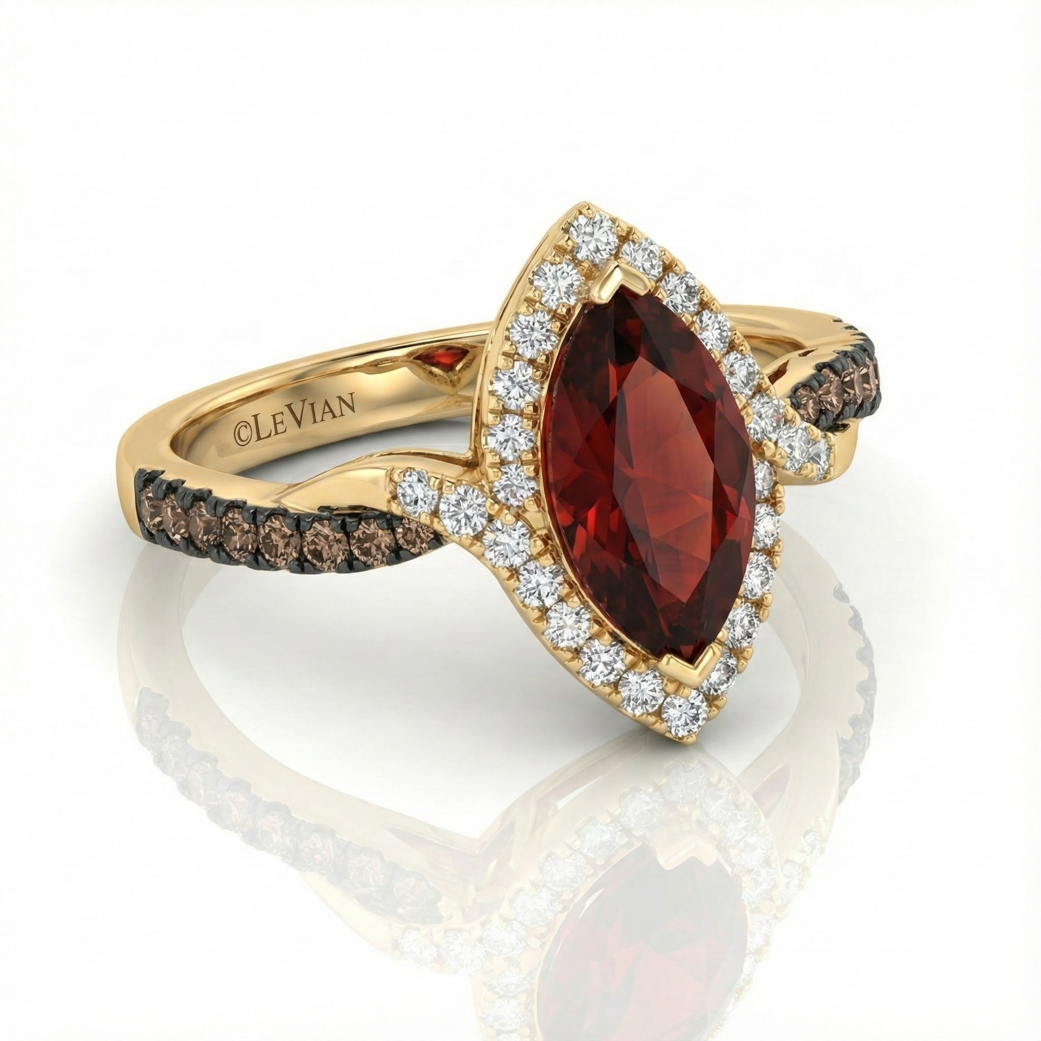 Le Vian® 14K Honey Gold™ Pomegranate Garnet™ & Chocolate/Nude Diamond® Ring (2.78ctw) Fiery, dramatic, and beautifully sculpted—this Le Vian® ring showcases a bold 2 1/4 ct. Pomegranate Garnet™ in an elongated marquise cut, radiating deep red brilliance