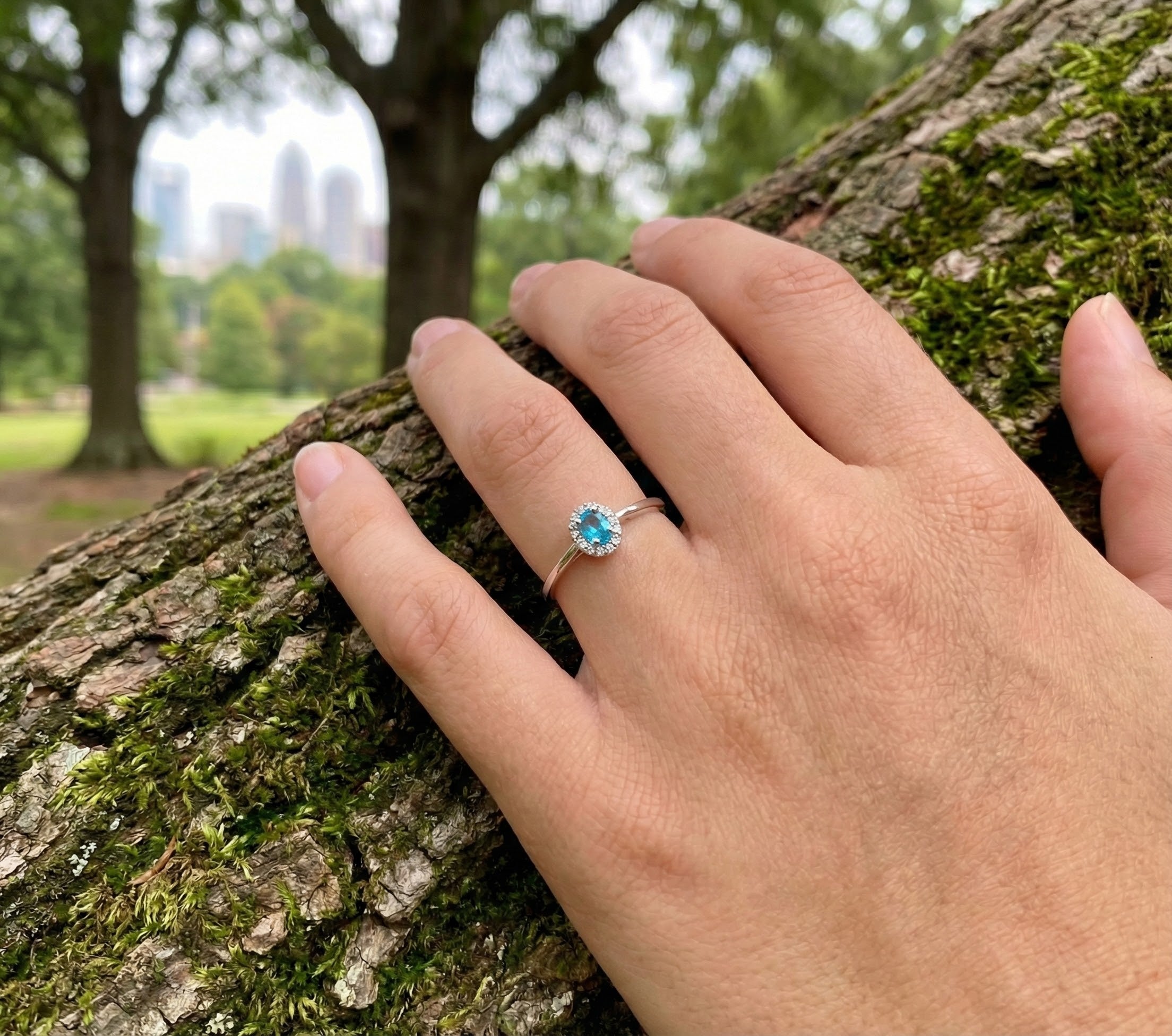 Blue Topaz & Diamond Halo Ring, 0.07 ctw