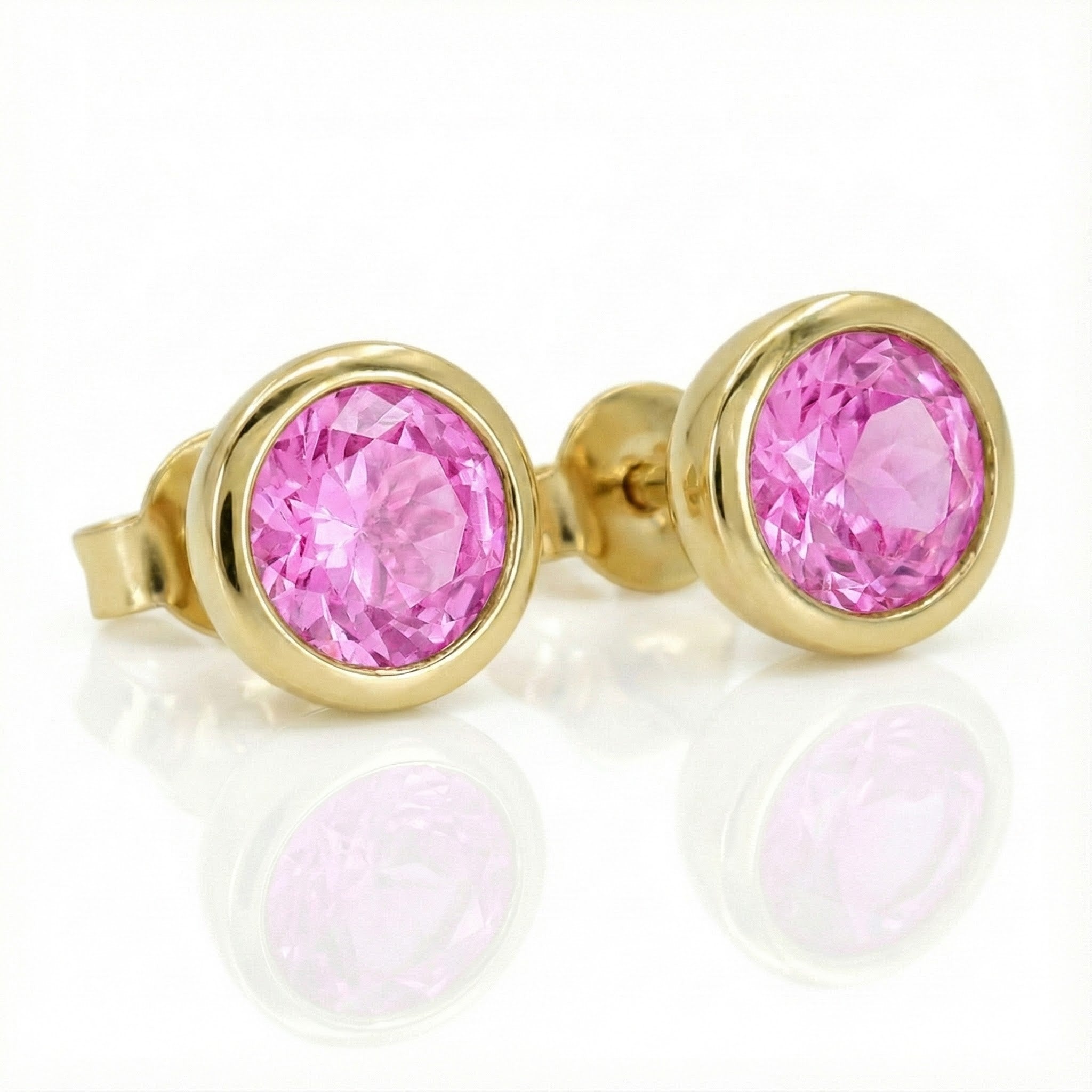 Madison L | Pink Topaz Bezel Stud Earrings | 14K Yellow Gold | Round Gemstone Studs - Brownee Jewelers