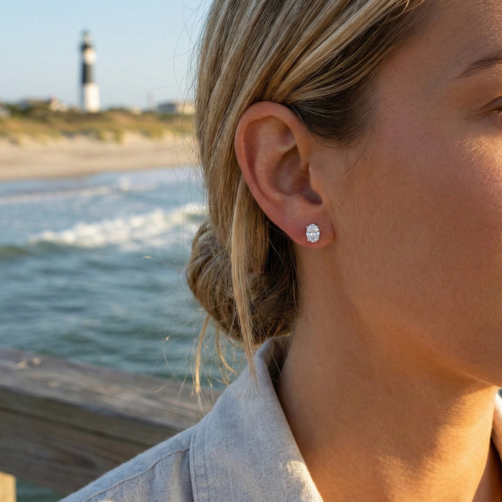 4 CTW Oval Solitaire Stud Earrings A timeless classic. These oval solitaire stud earrings are claw-set with Lafonn's signature Lassaire simulated diamonds in sterling silver bonded with platinum.