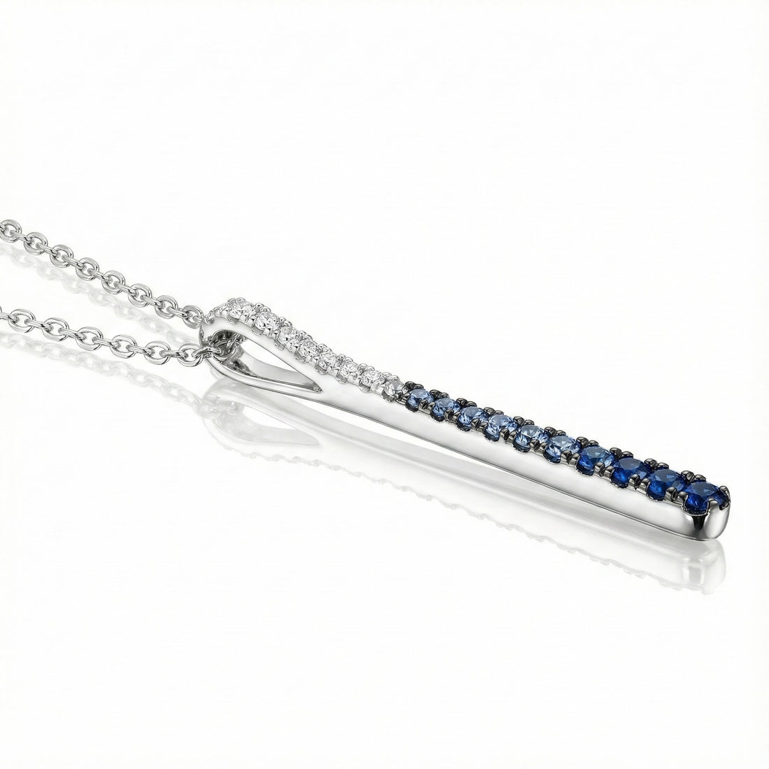 Le Vian® 14K Vanilla Gold® Denim Ombré® Sapphire & Vanilla Sapphire™ Pendant This sleek Le Vian® Ombre® pendant features a vertical bar design that transitions beautifully from deep midnight blue to soft sky blue