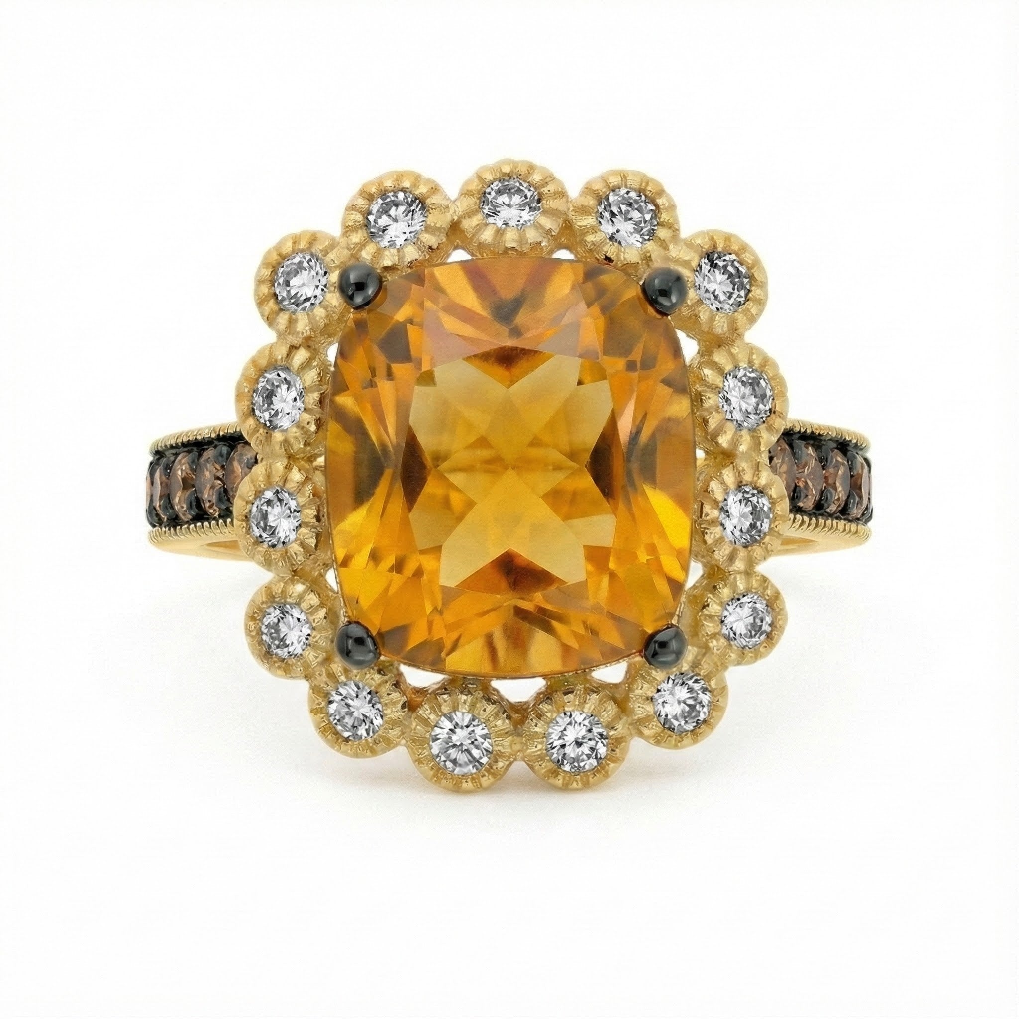 14K Yellow Gold Le Vian® Cinnamon Citrine® & Diamond Halo Ring This radiant Le Vian® ring showcases a vibrant cushion-cut Cinnamon Citrine® framed by a sparkling halo of white diamonds