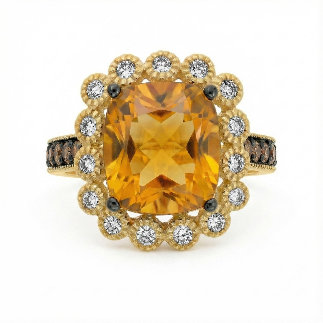 14K Yellow Gold Le Vian® Cinnamon Citrine® & Diamond Halo Ring This radiant Le Vian® ring showcases a vibrant cushion-cut Cinnamon Citrine® framed by a sparkling halo of white diamonds