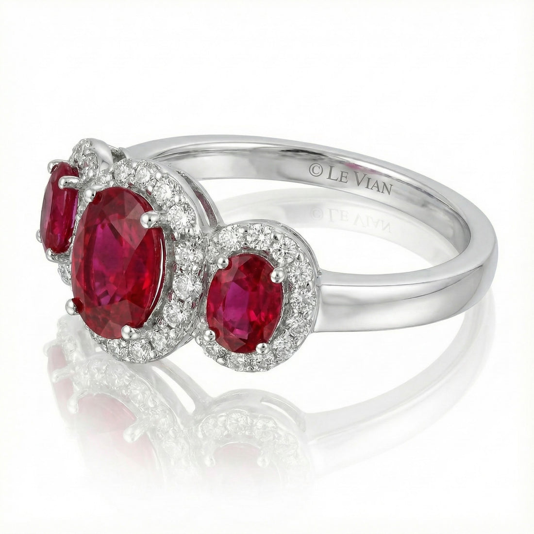 Le Vian® 14K Vanilla Gold® Passion Ruby® & Vanilla Diamond® Ring (1.05ctw) This stunning Le Vian® three-stone ring showcases 7/8 cts. of vivid Passion Ruby® gemstones wrapped in shimmering 1/5 cts