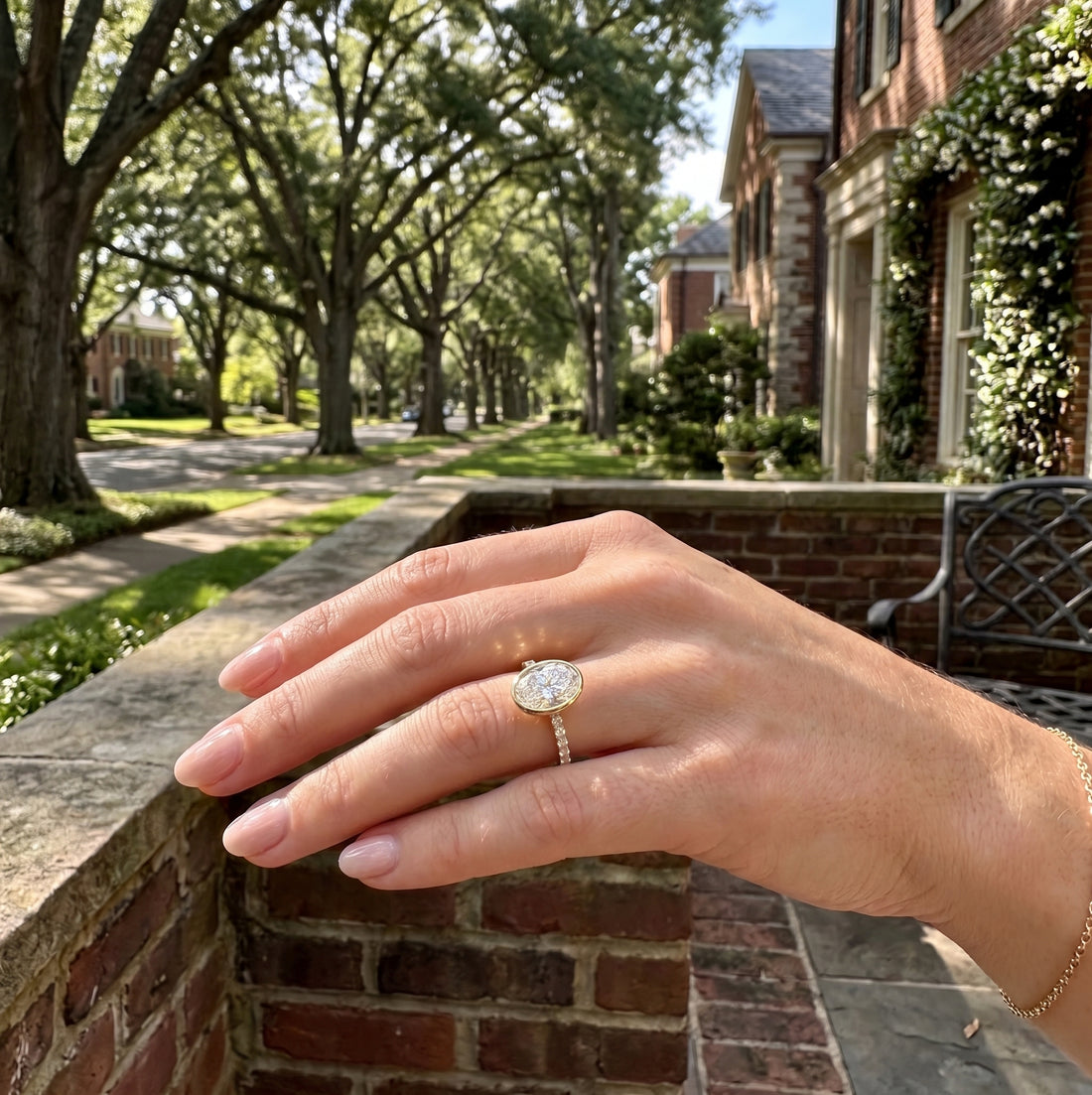 Oval Lab-Grown Diamond Engagement Ring | 14K Yellow Gold | Bezel Set with Round Side Diamonds | 2.23 ctw | Modern Solitaire - Brownee Jewelers