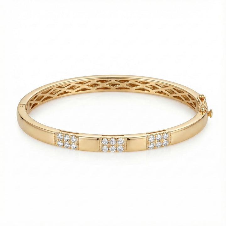 Le Vian® 14K Honey Gold™ Nude Diamond™ Bangle (1/2 ctw) This elegant Le Vian® bangle showcases 1/2 carat of Nude Diamonds™ arranged in three shimmering diamond-accented stations.