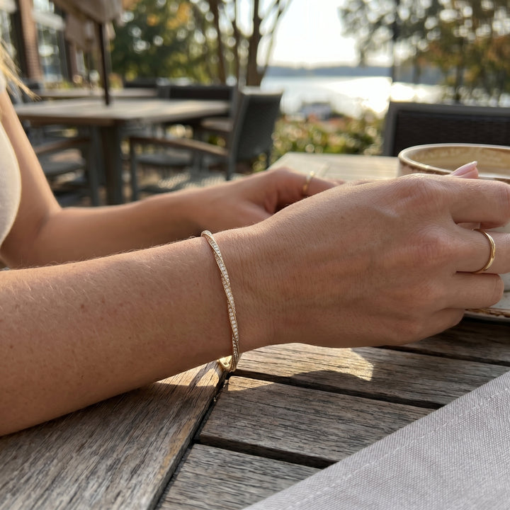 Pavé Diamond Twist Flexible Bangle Bracelet | 14K Yellow Gold | 2.40 CTW Diamonds | Twisted Crossover Design | BDD7274-301 - Brownee Jewelers