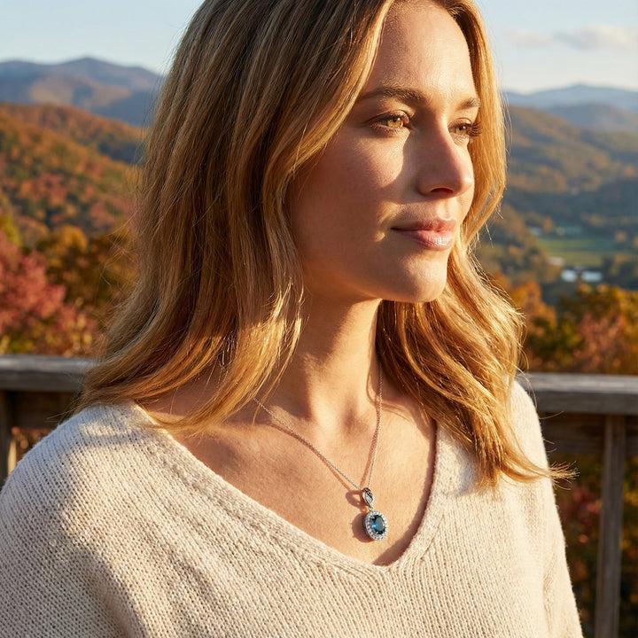 Le Vian® Deep Sea Blue Topaz™ & Diamond Pendant in 14K Vanilla Gold® Striking and sophisticated, this Le Vian® pendant showcases a vivid 1 1/4 cts. Deep Sea Blue Topaz™, framed by 1/4 ct. of soft, luminous Nude Diamonds™