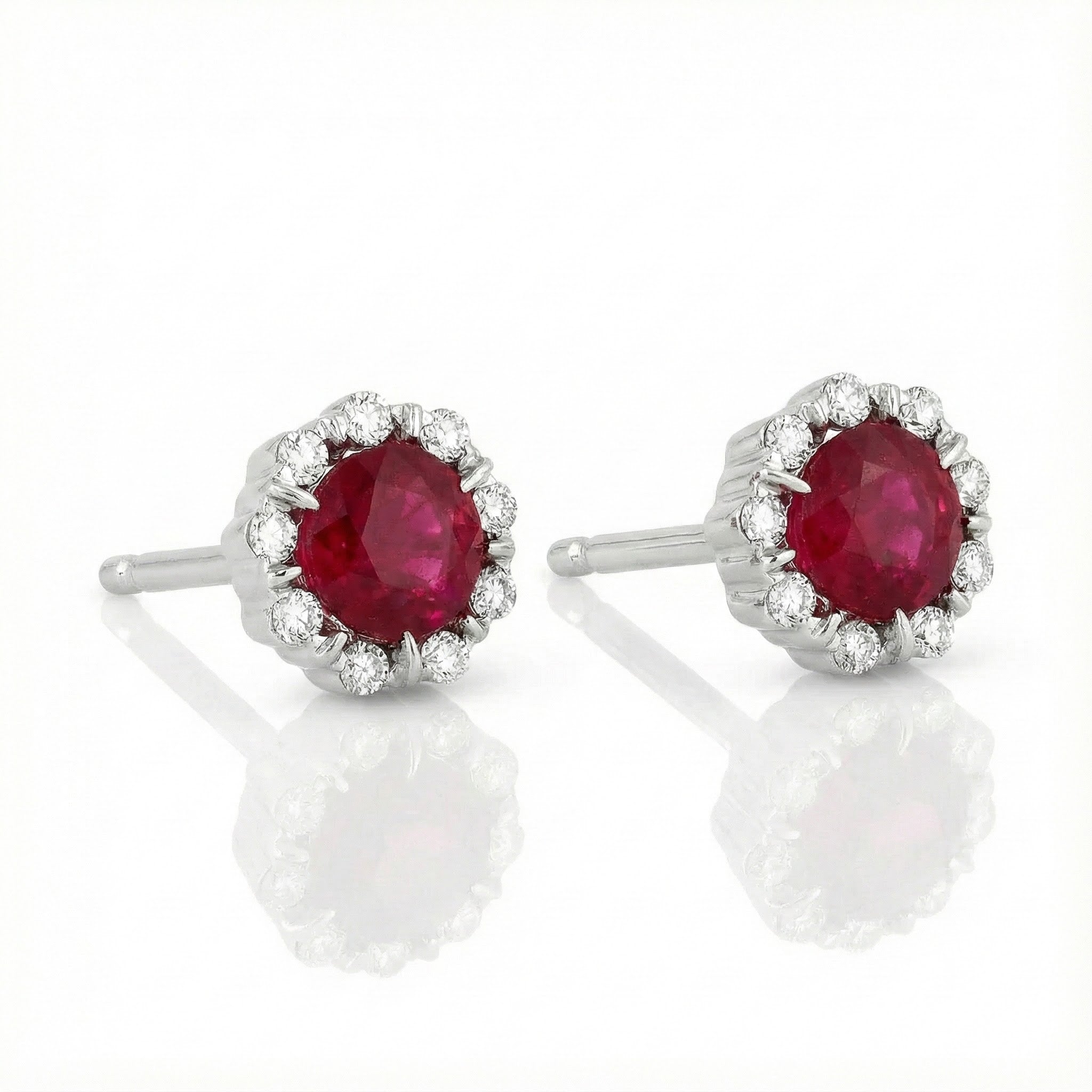 Madison L | Ruby & Diamond Halo Stud Earrings | 14K White Gold | Round Ruby | Diamond Accents - Brownee Jewelers