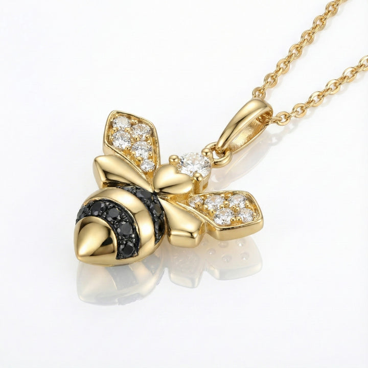 Le Vian® 14K Honey Gold™ Bee Pendant with Nude Diamonds™ & Blackberry Diamonds® Sweet, symbolic, and full of sparkle, this charming Le Vian® bee pendant is crafted in warm, glowing 14K Honey Gold™