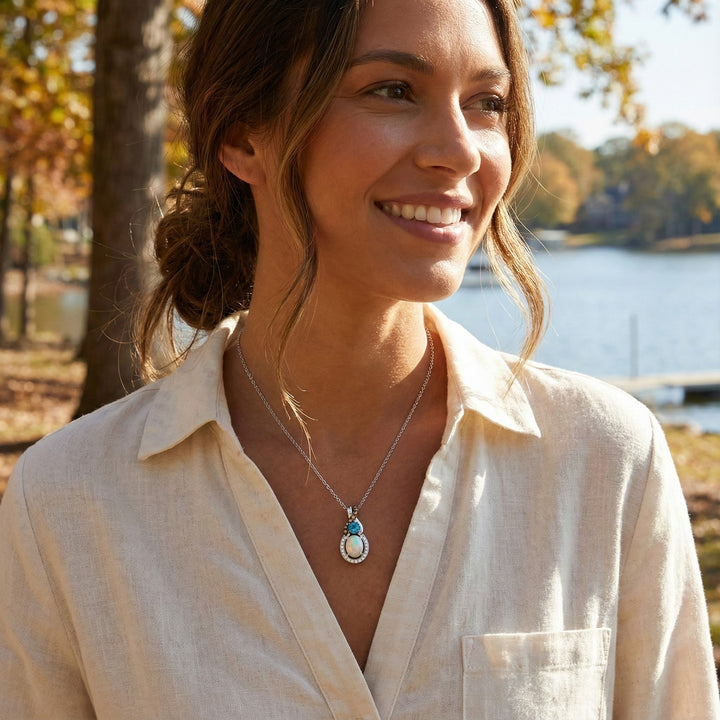 Le Vian® 14K Vanilla Gold® Neopolitan Opal®, Deep Sea Blue Topaz™ & Diamond Pendant (0.71ctw) Colorful, elegant, and full of Le Vian® charm—this Chocolatier® pendant features a glowing 3/8 ct. Neopolitan Opal®, paired with a vibrant 1/6 ct. Deep Sea Blue Topaz™ for a striking pop of color.