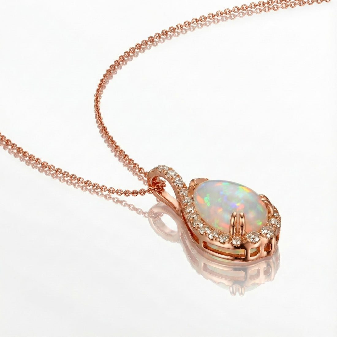 Le Vian® 14K Strawberry Gold® Neopolitan Opal® & Nude Diamond™ Pendant (2.85ctw) Ethereal, romantic, and unmistakably Le Vian®—this stunning pendant features a glowing 2 1/5 ct. Neopolitan Opal® radiating soft pastel flashes