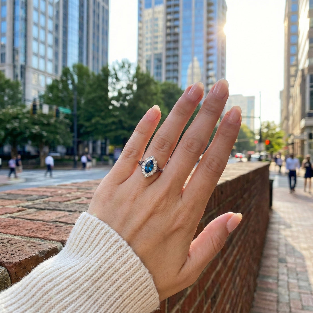 Le Vian® 14K Vanilla Gold® Deep Sea Blue Topaz™ & Chocolate/Nude Diamond® Ring (1.45ctw) Bold color meets elegant sparkle in this stunning Le Vian® ring featuring a vibrant 1 ct. Deep Sea Blue Topaz™ in an elongated marquise cut