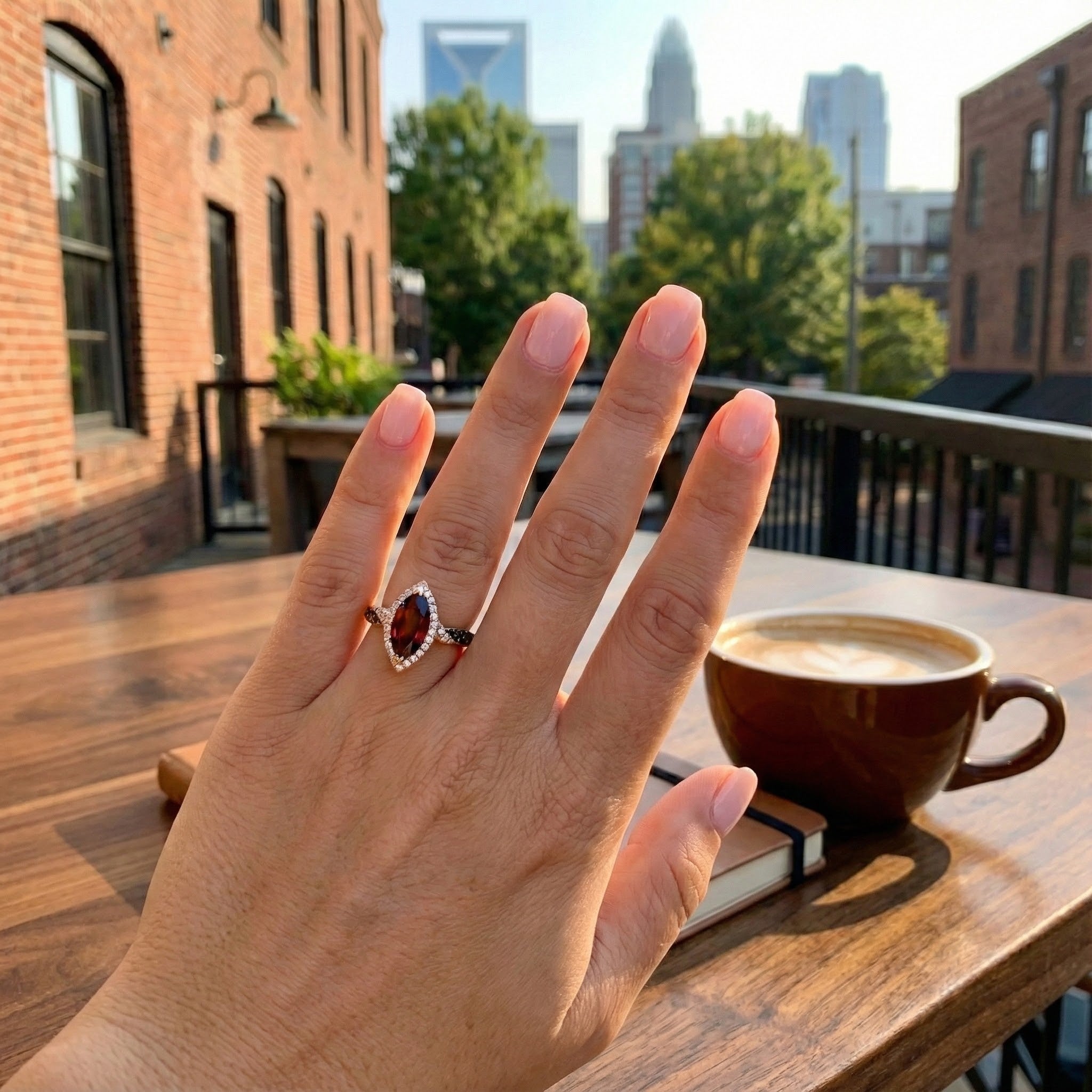 Le Vian® 14K Honey Gold™ Pomegranate Garnet™ & Chocolate/Nude Diamond® Ring (2.78ctw) Fiery, dramatic, and beautifully sculpted—this Le Vian® ring showcases a bold 2 1/4 ct. Pomegranate Garnet™ in an elongated marquise cut, radiating deep red brilliance