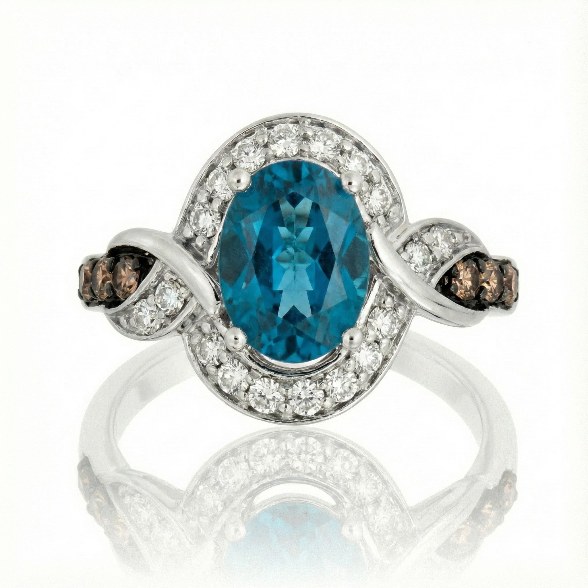 Le Vian® 14K Vanilla Gold® Ring with Deep Sea Blue Topaz™, Chocolate Diamonds® & Nude Diamonds™ Brilliant blue color meets sophisticated contrast in this stunning Le Vian® design