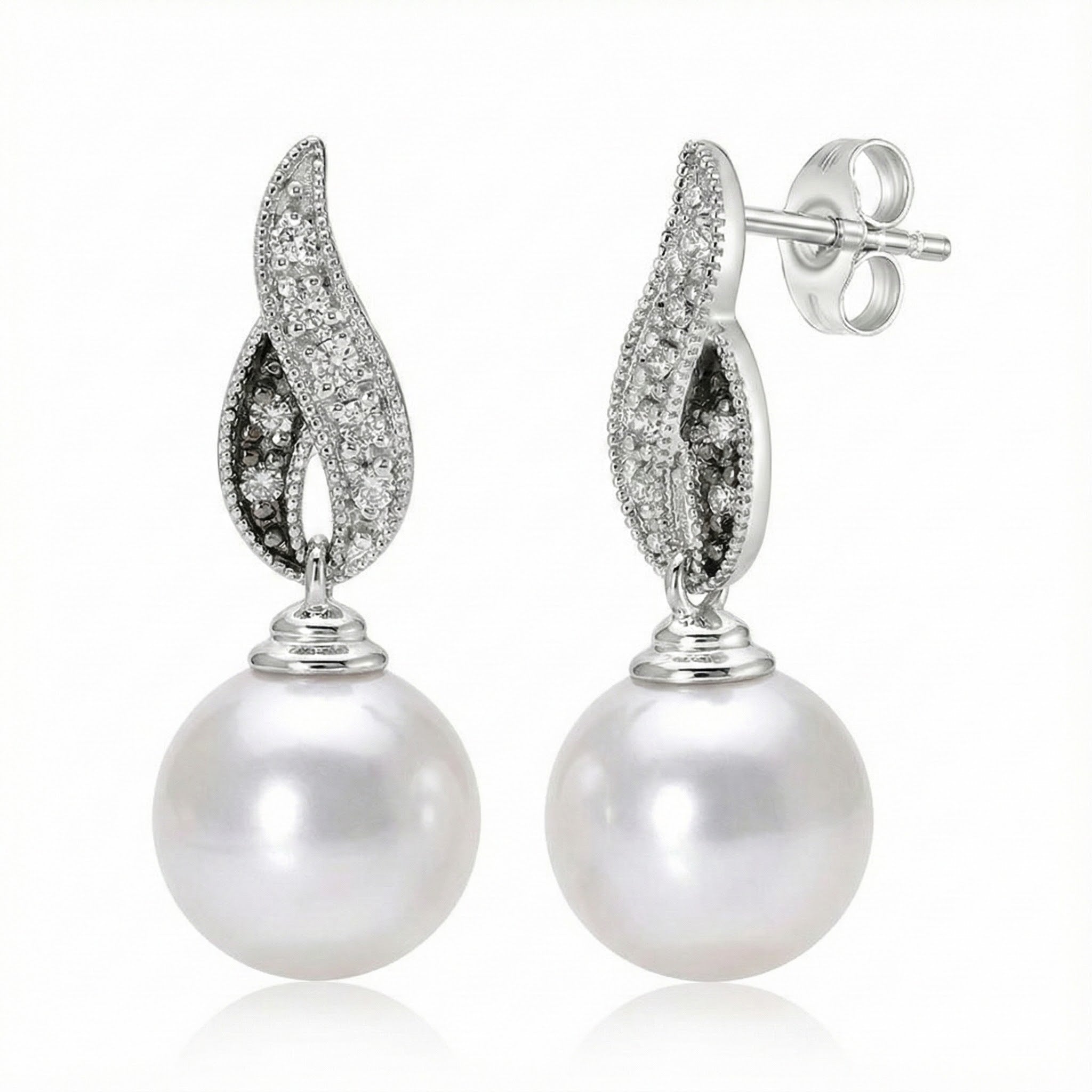 Le Vian® Vanilla Pearl & Diamond Drop Earrings – 14K Vanilla Gold® Graceful and luminous, these elegant drop earrings by Le Vian showcase glowing Vanilla Pearls™ suspended beneath sculpted diamond-accented motifs
