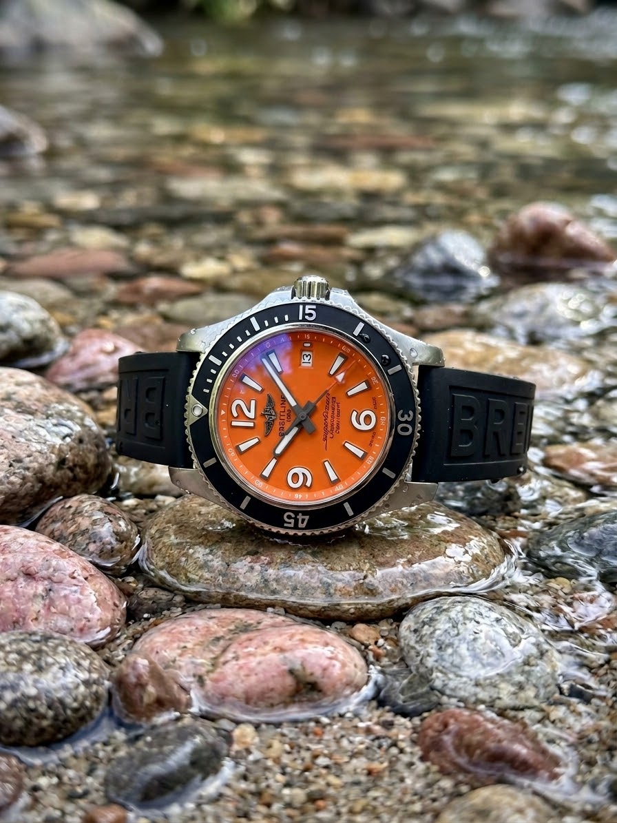 GTS BREITLING PRE OWNED BLK/ORANGE WATCH