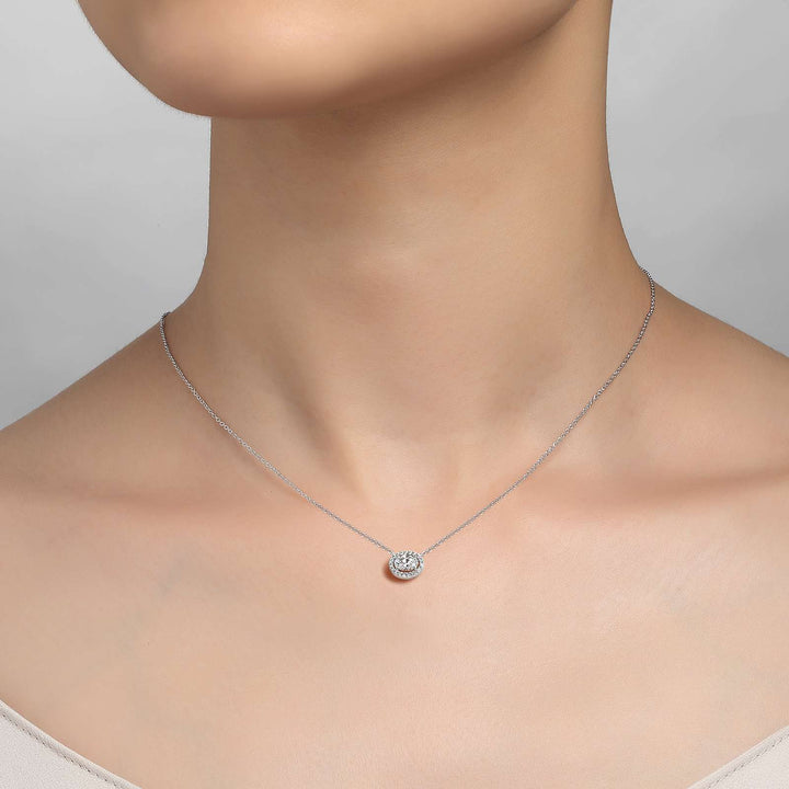 Timeless elegance. This halo necklace features Lafonn's signature Lassaire oval and round simulated diamonds in sterling silver bonded with platinum.