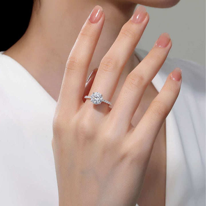 A timeless classic. This shimmering round solitaire ring features Lafonn's signature simulated diamond artistically held in the center by four claw prongs, 