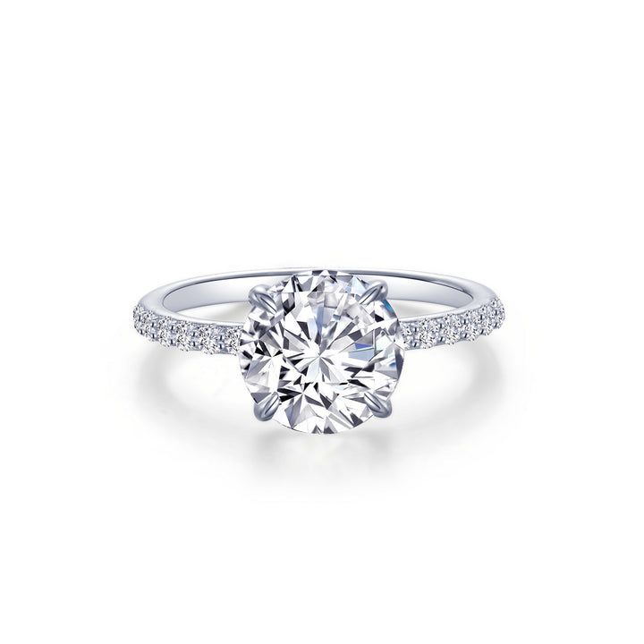 A timeless classic. This shimmering round solitaire ring features Lafonn's signature simulated diamond artistically held in the center by four claw prongs, 