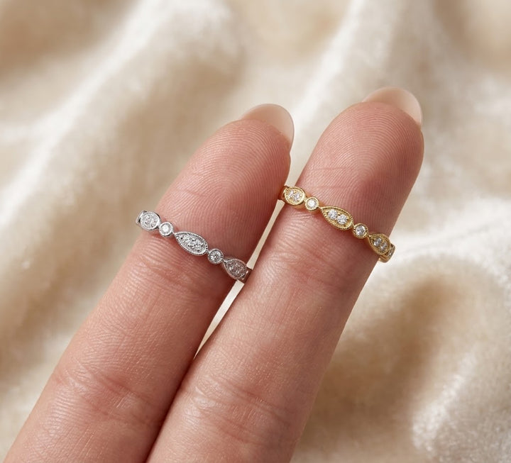 0.10 Total Carat Weight Alternating Round and Pear-Shaped Diamond Station Stack Ring in 14K White Gold