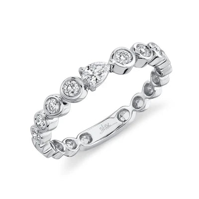 0.35 CTW DIAMOND PEAR BEZEL BAND IN 14K WHITE GOLD