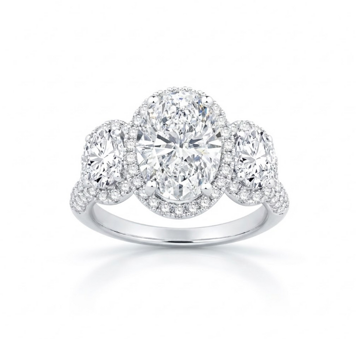 Oval Lab-Grown Diamond Three-Stone Halo Ring | 14K White Gold | 3.00 ct Center, 4.63 ctw | Oval Side Diamonds - Brownee Jewelers