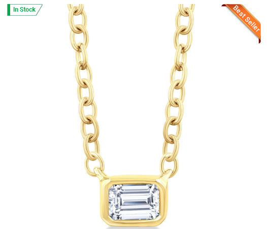 10kt yellow gold Emerald cut diamond bezel set east to west 