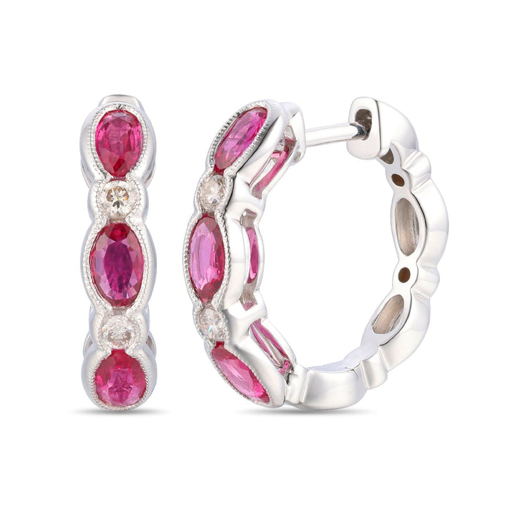 1.56 TOTAL CARAT WEIGHT OVAL RUBY AND .16 TOTAL CARAT WEIGHT ROUND DIAMOND BEZEL HUGGIE EARRINGS IN 14K WHITE GOLD
