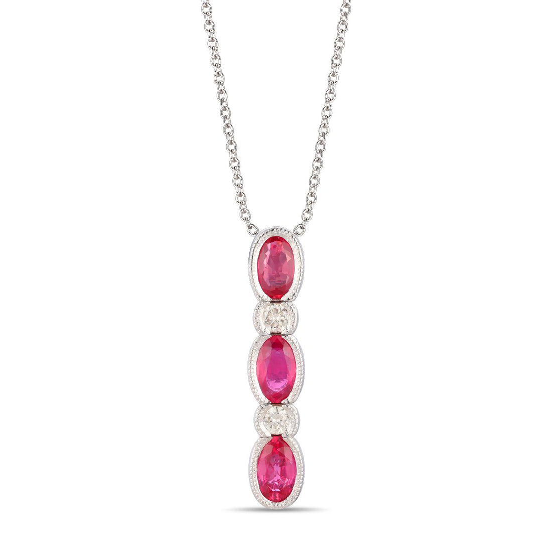 .78 TOTAL CARAT WEIGHT OVAL RUBY AND .08 TOTAL CARAT WEIGHT ROUND DIAMOND BEZEL DROP PENDANT IN 14K WHITE GOLD