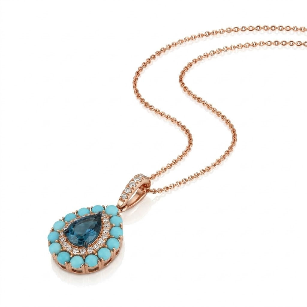 1 CARAT PEAR SHAPED DEEP BLUE TOPAZ PENDANT WITH .22 TOTAL CARAT WEIGHT ROUND DIAMOND AND .98 TOTAL CARAT WEIGHT ROUND TURQUOISE HALOS IN 14K ROSE GOLD