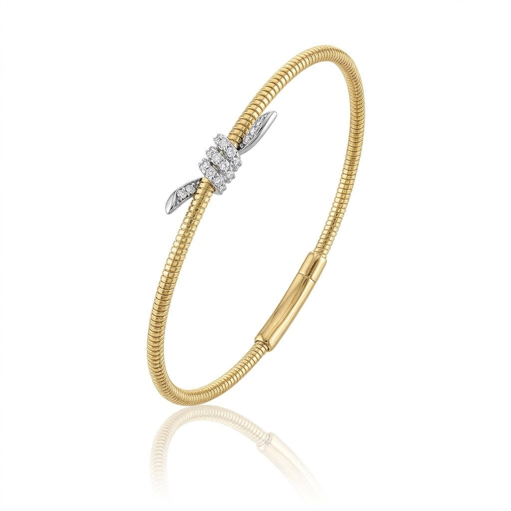 .18 Total Carat Weight Diamond Spiral Bangle in White and Yellow Gold with a Size of 6.75 Inches