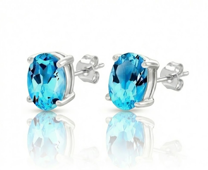 Oval Blue Topaz Stud Earrings | 14K White Gold | 7×5 mm | Push Back | - Brownee Jewelers