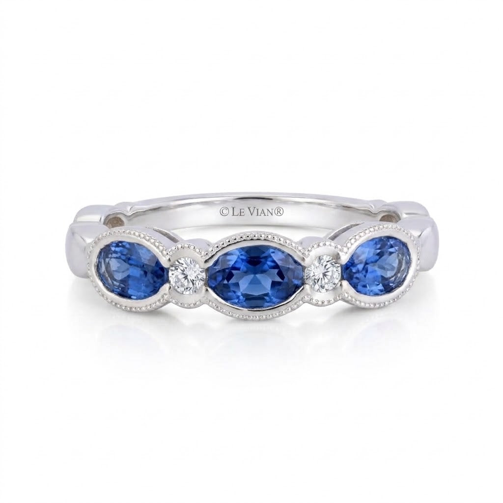 .81 TOTAL CARAT WEIGHT BLUE SAPPHIRE & .06 TOTAL CARAT WEIHGT DIAMOND BEZEL BAND IN 14K WHITE GOLD