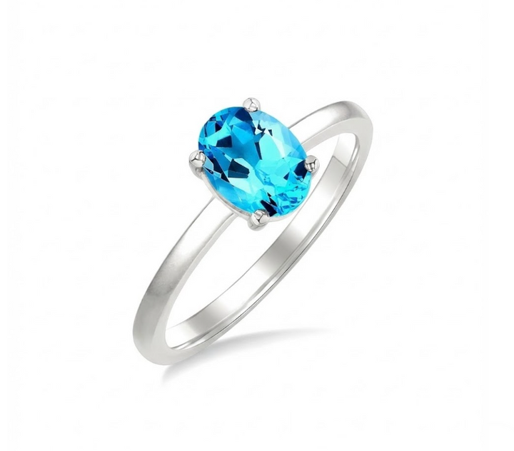 Oval Blue Topaz Solitaire Ring | 14K White Gold | 8×6 mm | Size 7 | - Brownee Jewelers