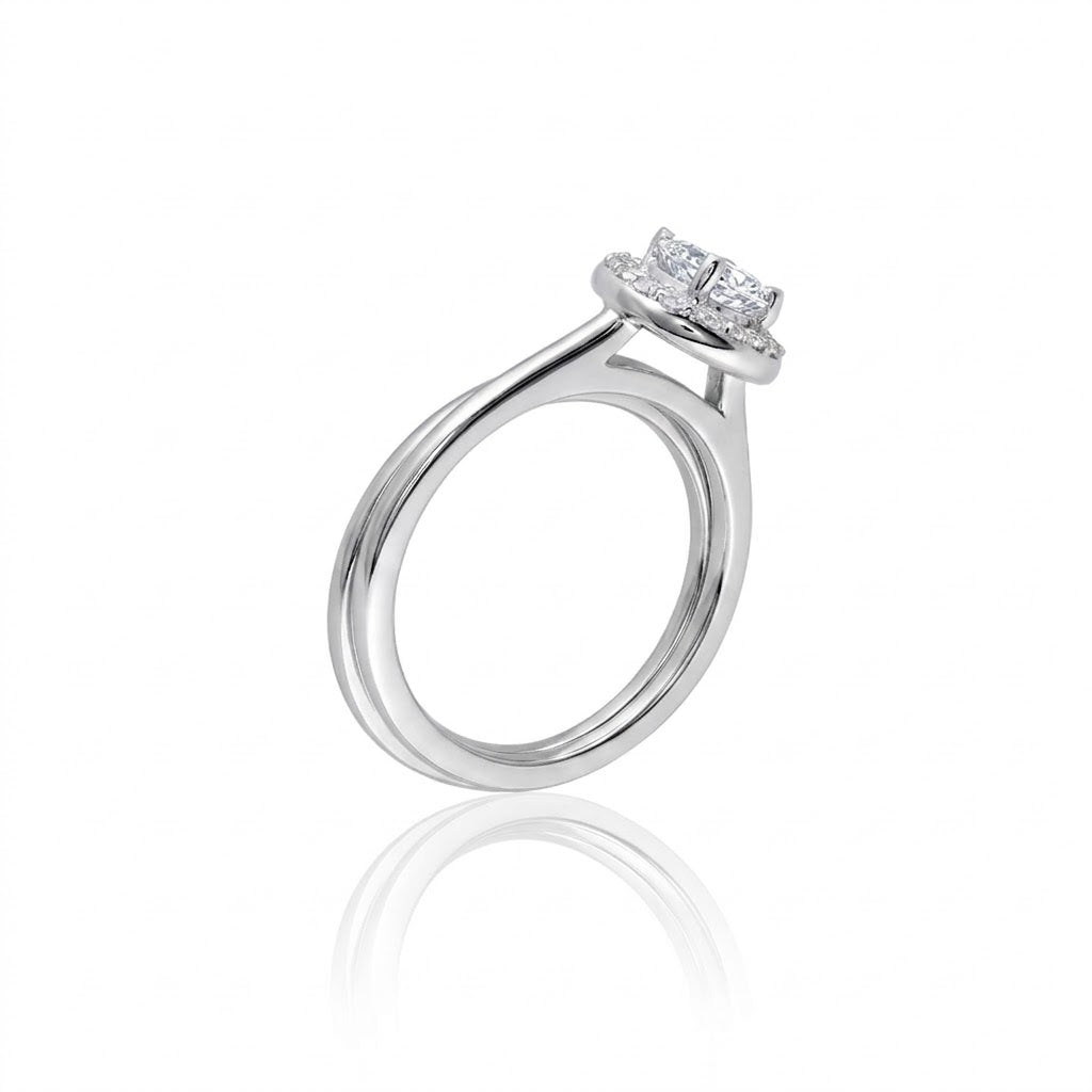 0.57 Carat Pear-Shaped Diamond with Diamond Halo Bridal Ring Set in 14K White Gold