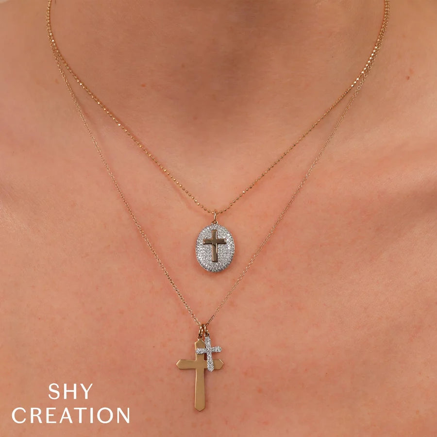 0.07 TOTAL CARAT WEIGHT DIAMOND PAVE CROSS NECKLACE IN 14K YELLOW AND WHITE GOLD
