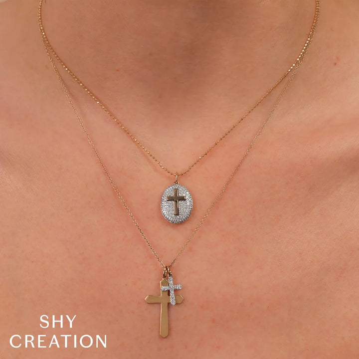 0.07 TOTAL CARAT WEIGHT DIAMOND PAVE CROSS NECKLACE IN 14K YELLOW AND WHITE GOLD