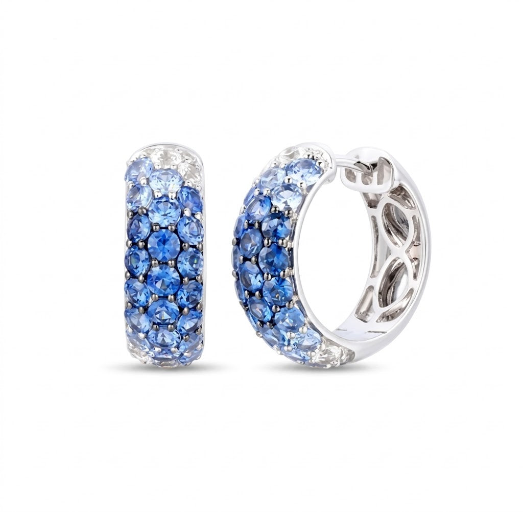 Le Vian® 14K Vanilla Gold® Denim Ombré® Sapphire & Vanilla Sapphire™ Hoop Earrings These striking Le Vian® Ombre® hoop earrings showcase a seamless gradient of 2 3/8 cts. Denim Ombré® Sapphires, transitioning from deep twilight blue to soft sky blue