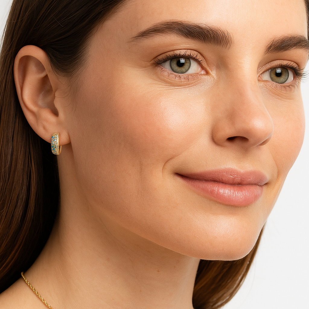 14kt yellow gold medium huggies with green and blue gems 