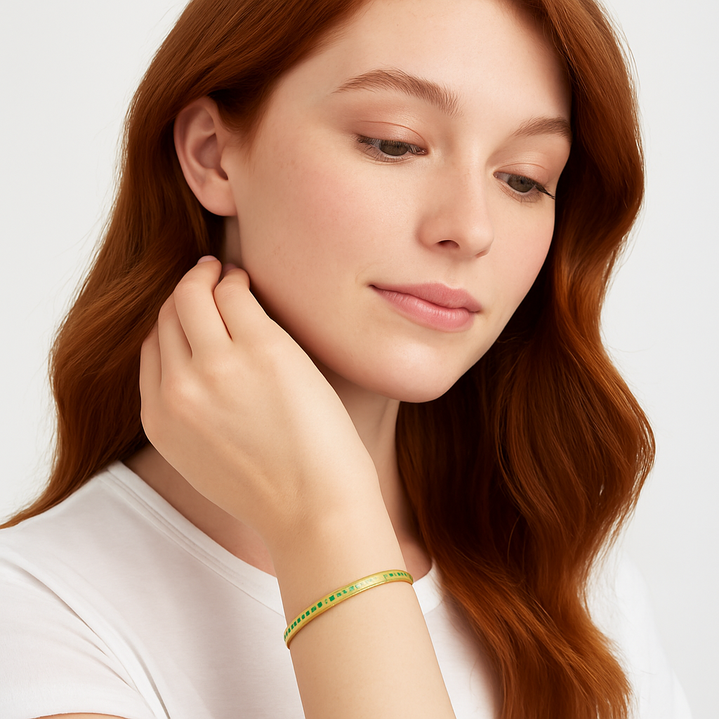 Green emerald yellow gold bangle 