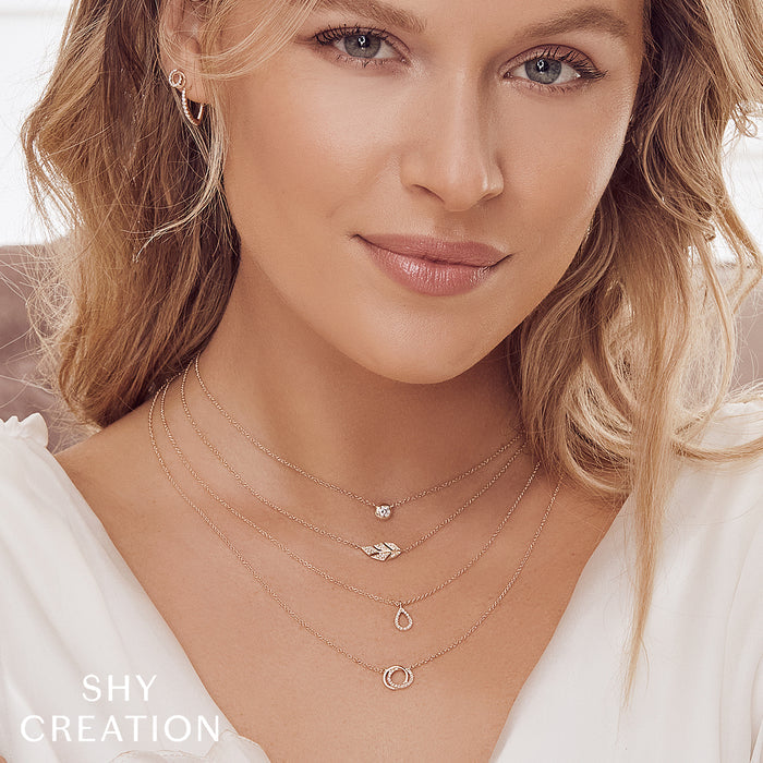 0.07 TOTAL CARAT WEIGHT DIAMOND LOVE KNOT CIRCLE NECKLACE IN 14K YELLOW GOLD
