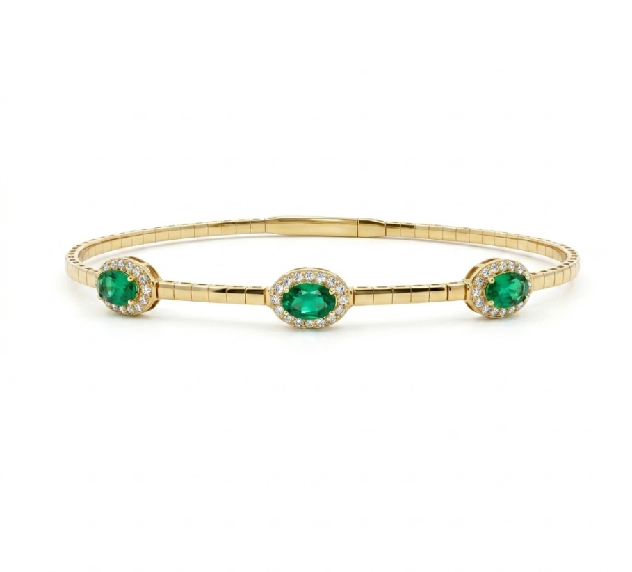 Emerald Halo Bangle | 14K Yellow Gold | Oval Emerald & Diamond Bangle Bracelet | 1.16CT Emerald & .255CT Diamond Accent - Brownee Jewelers