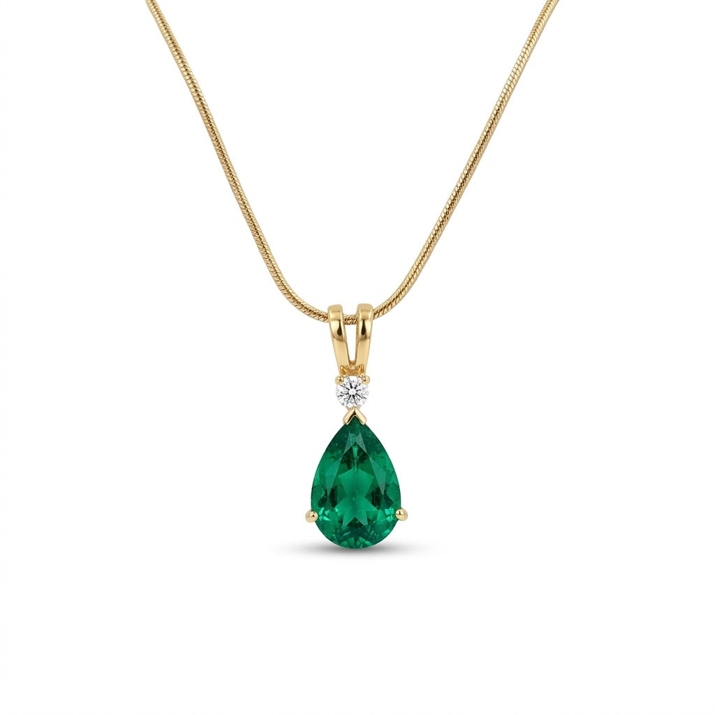 3.46 Carat Pear-Shaped Emerald and .10 Carat Round Diamond Pendant in 18kt Yellow Gold