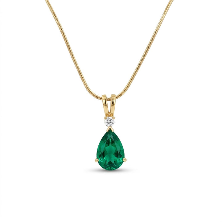 3.46 Carat Pear-Shaped Emerald and .10 Carat Round Diamond Pendant in 18kt Yellow Gold