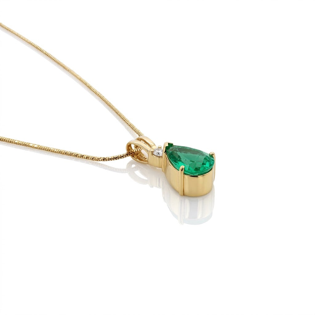 3.46 Carat Pear-Shaped Emerald and .10 Carat Round Diamond Pendant in 18kt Yellow Gold