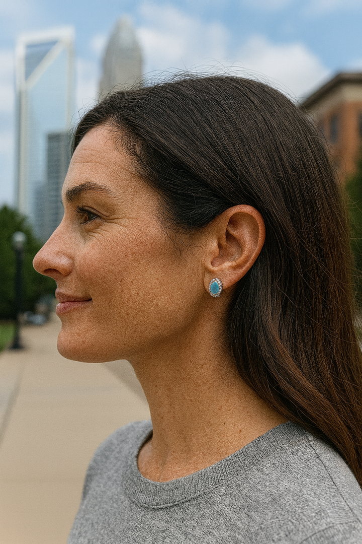 14K White Gold 3.61ct Opal & .52ct Diamond Stud Earrings. Radiant and eye-catching, these 14K White gold stud earrings feature 3.61 carats of glowing oval opals, each alive with vibrant flashes of green, orange, and blue. - 6635426204 - Brownee Jewelers