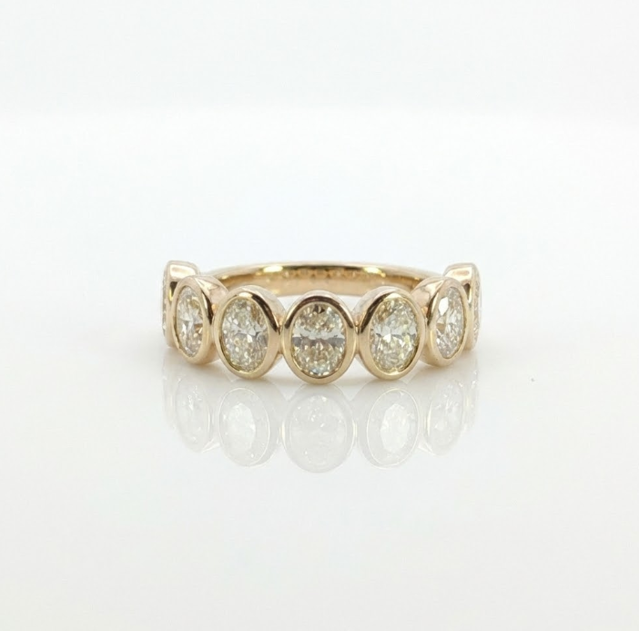 Oval Lab-Grown Diamond Band | 14K Yellow Gold | Bezel Set Wedding Ring | Seven Stone - Brownee Jewelers